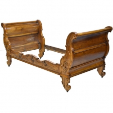 French Walnut Sleigh Day Bed with Articulated Carvings in a Provincial Style
