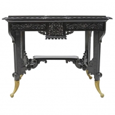 Aesthetic Movement Centre Table in Carved Ebonized Wood with Brass Feet